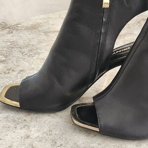 DKNY Black and Gold Peep-Toe Heeled Boots